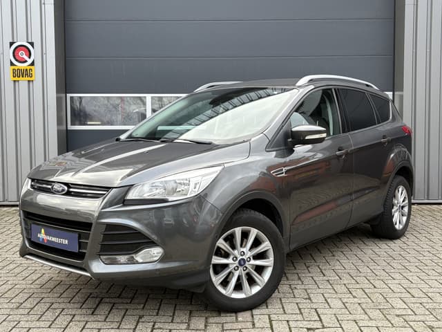 Ford Kuga 1.5 Titanium | Navi | Leder | PDC | Trekhaak | Cruise & Climate Control | All Season | Interesse? Bel of App naar: 06 30 51 05 90